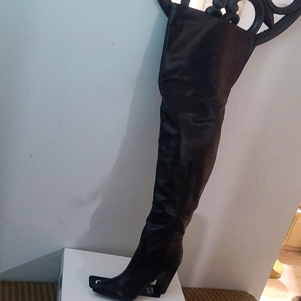 Black thigh high leather boots